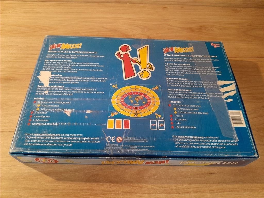 New Amigos - Het talenspel - Engels - Nederlands - s5861, Hobby en Vrije tijd, Gezelschapsspellen | Bordspellen, Verzenden, Zo goed als nieuw