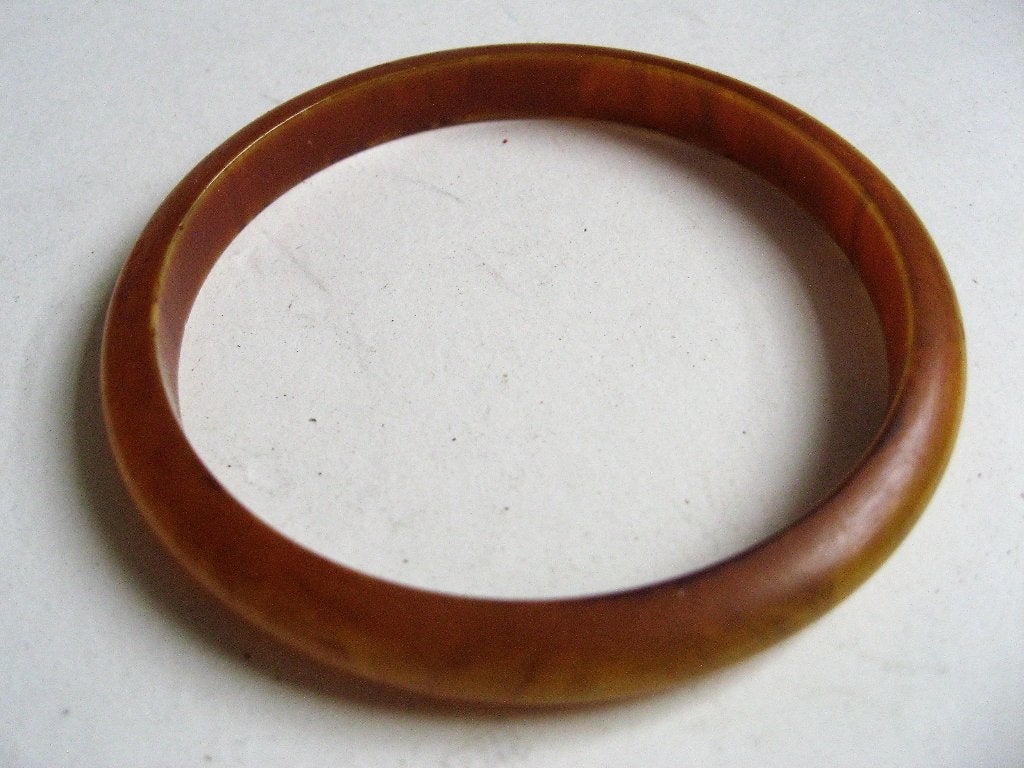 Antieke bakeliet barnsteen armband jaren 30, Ophalen of Verzenden, Dames