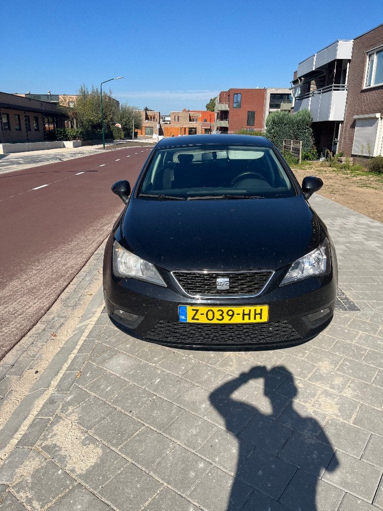 Seat Ibiza 1.4 63KW 5DRS 2012 Zwart, Voorwielaandrijving, 40 €/maand, 4 cilinders, Handgeschakeld