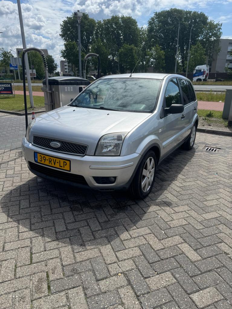 Ford Fusion 1.4 16V 2005 Grijs, Auto's, Ford, Voorwielaandrijving, 40 €/maand, Metallic lak, Origineel Nederlands