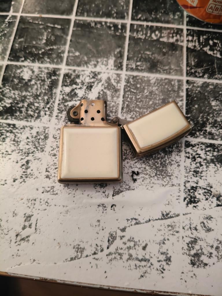 Zippo, Ophalen, Gebruikt, Aansteker