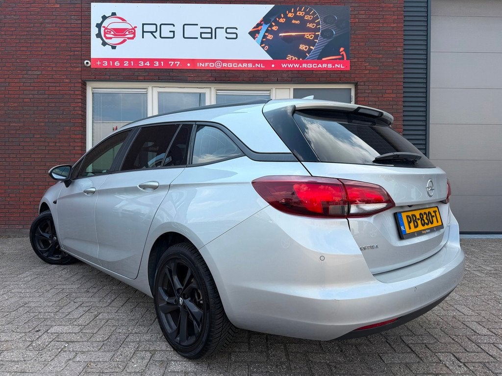 Opel Astra Sports Tourer 1.0 Online Edition / Navi / Camera, Stof, Gebruikt, 1178 kg, Met garantie (alle)