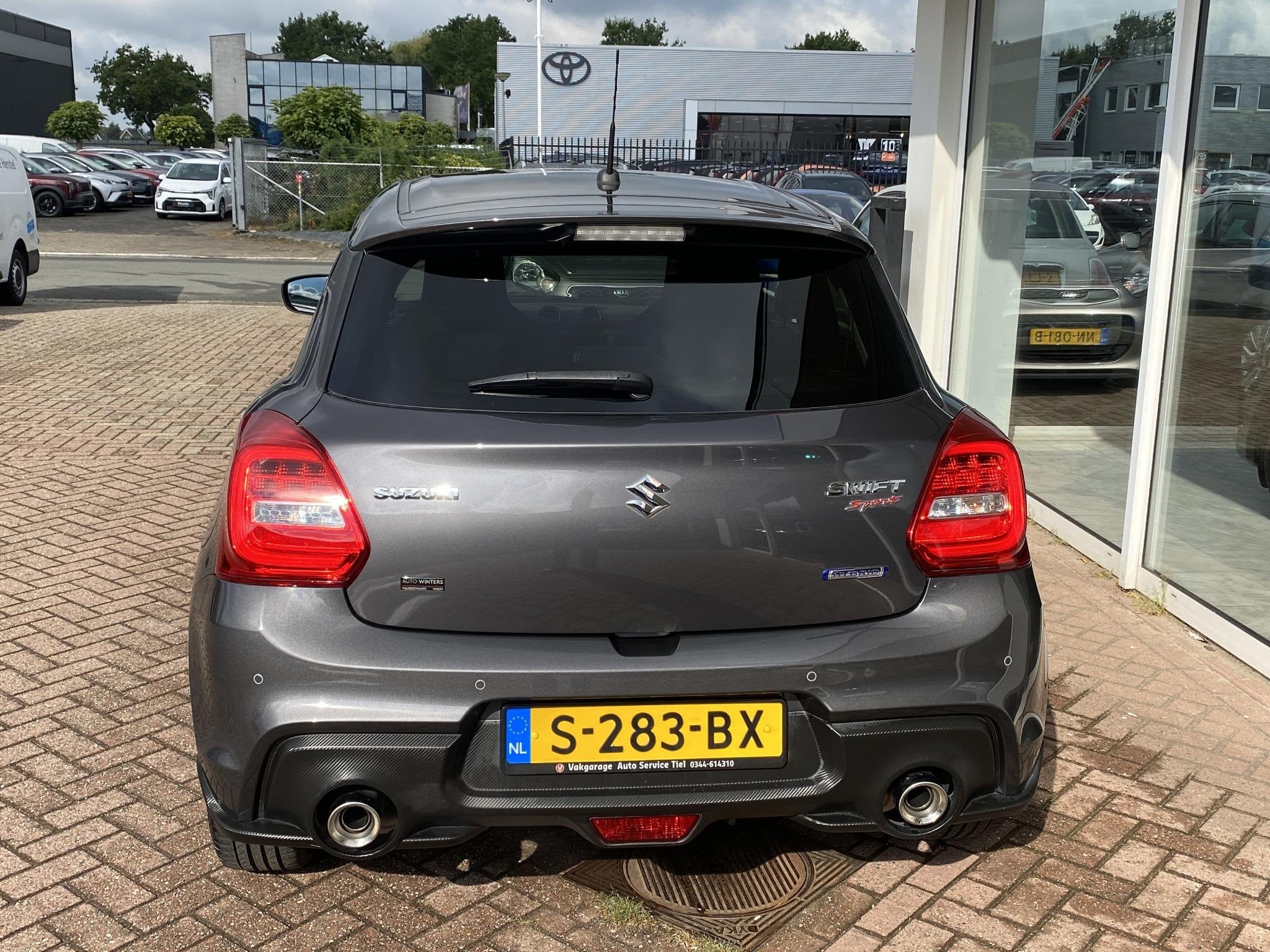 Suzuki Swift 1.4 Sport Smart Hybrid luxe uitvoering in nieuw, Auto's, Voorwielaandrijving, Stof, Euro 6, 4 cilinders
