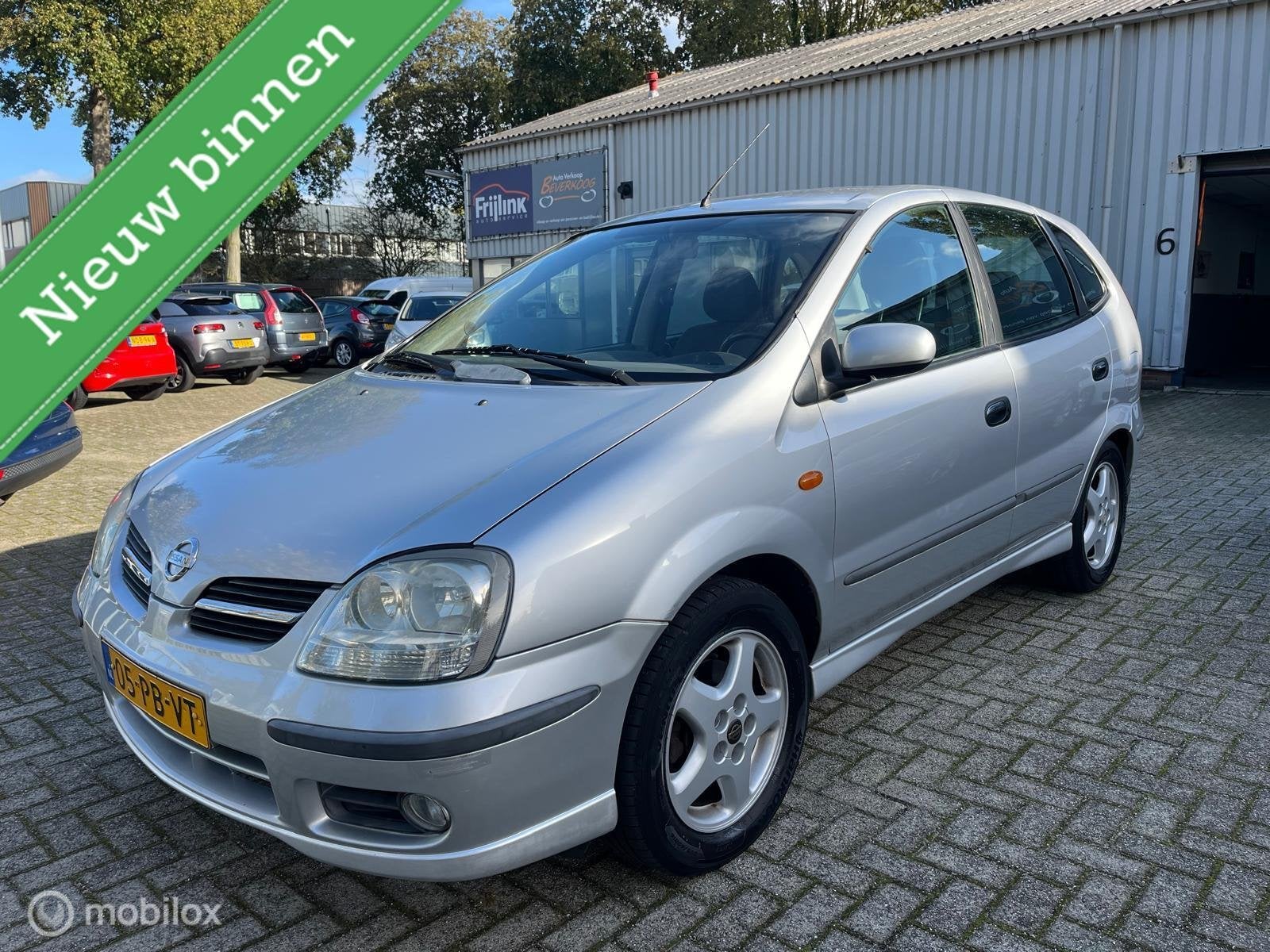 Nissan Almera Tino 1.8 Tekna / AUTOMAAT, Auto's, Stof, Elektrische ramen, 4 cilinders, 700 kg