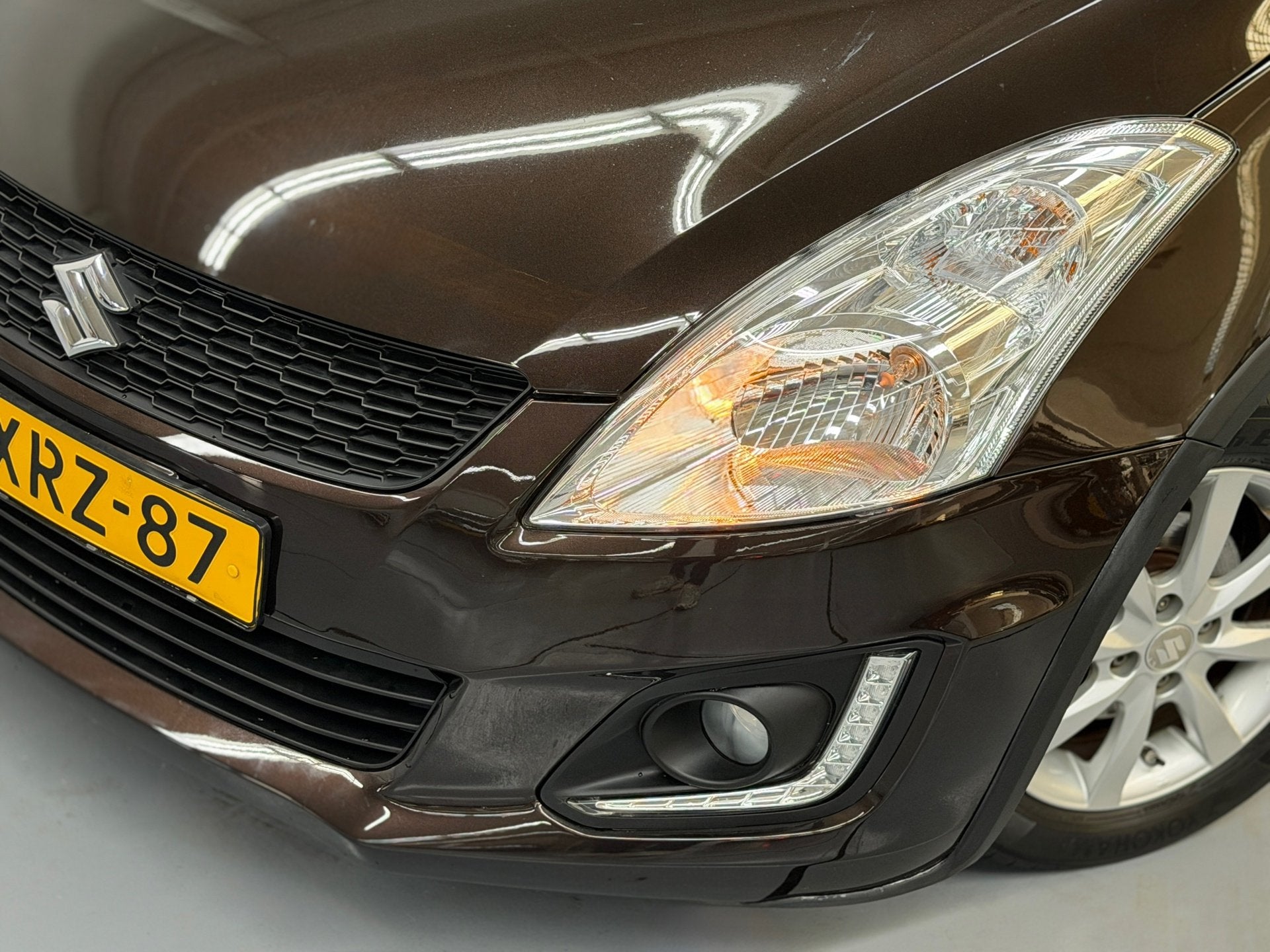 Suzuki Swift 1.2 Dynamic EASSS Led Airco Cruise Stoelverwarm, Auto's, Stof, Gebruikt, 4 cilinders, Bruin