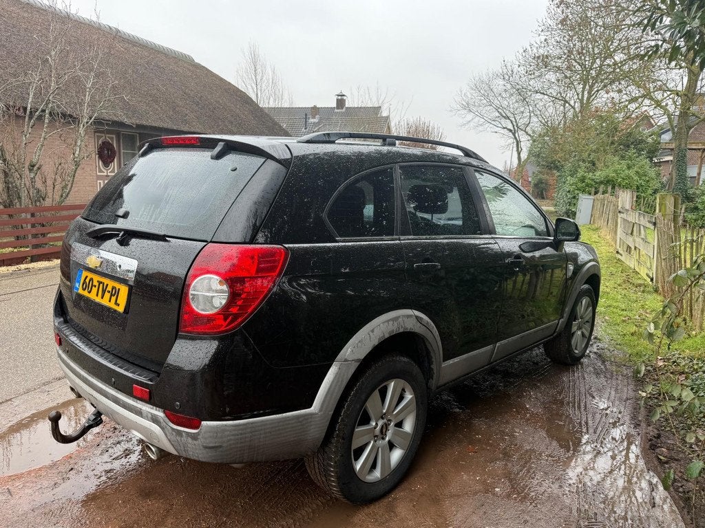 Chevrolet Captiva 3.2i Executive Leer/4x4/Scherm/7-Pers, Auto's, Chevrolet, 1780 kg, 3195 cc, Gebruikt, Zwart