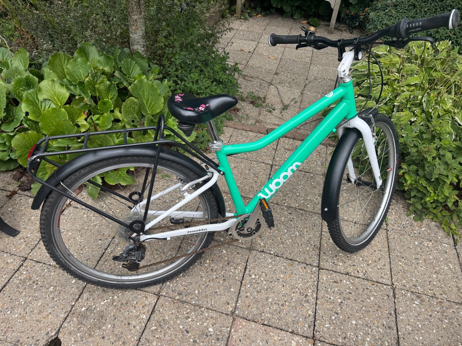 Woom 4 kinderfiets - Lichtgewicht en in gebruikte staat, Fietsen en Brommers, Fietsen | Kinderfietsjes, Ophalen, Gebruikt, Velgrem