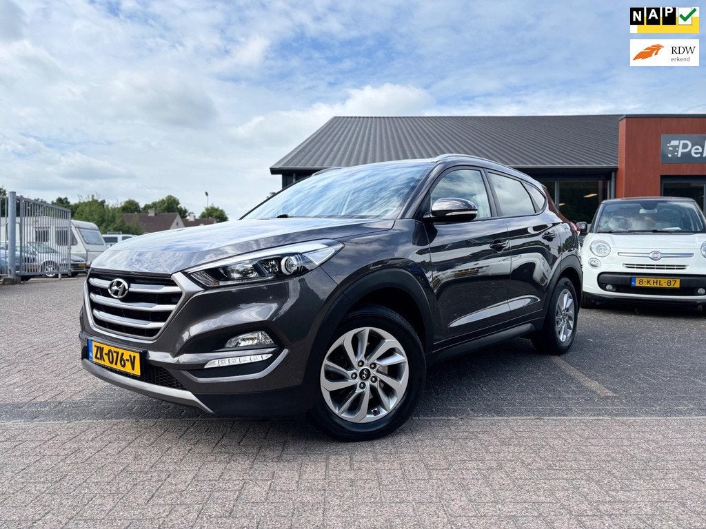Hyundai Tucson 1.6 GDi Premium*Navigatie*Pdc*Stoelverwarming, Auto's, Voorwielaandrijving, Gebruikt, 4 cilinders, Bruin