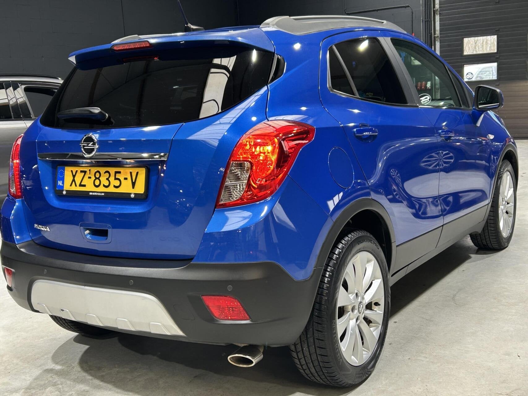 Opel Mokka 1.4 T Cosmo, Gebruikt, 4 cilinders, Blauw, Leder en Stof