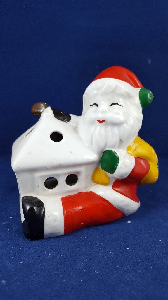 Vintage kerstdecoratie: kerstman waxinelichtjeshouder. W3