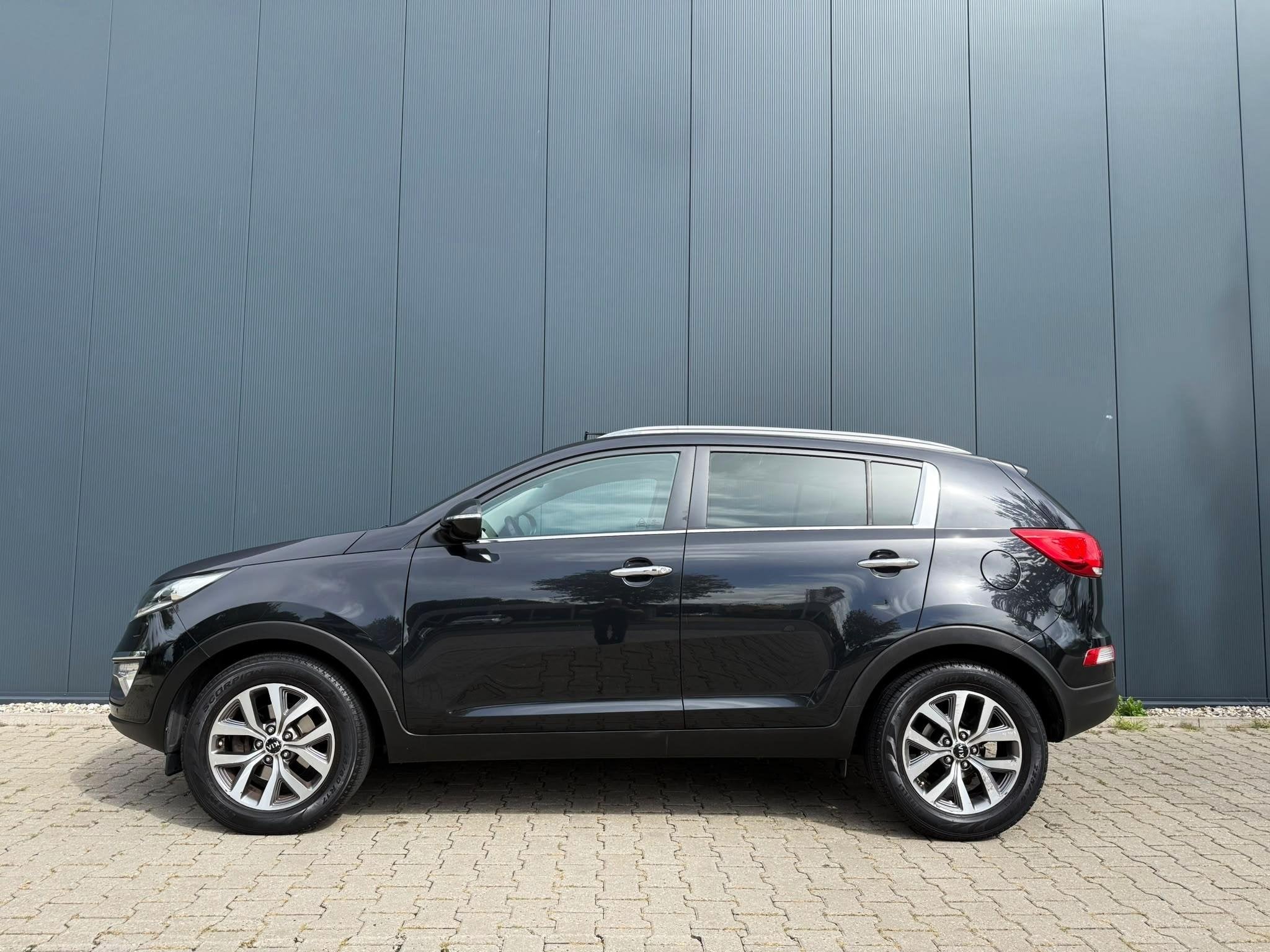 Kia Sportage 1.6 GDI ExecutiveLine pano leder camera, Auto's, Voorwielaandrijving, 135 pk, 4 cilinders, Zwart