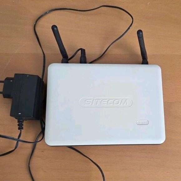 Sitecom 539D28 router met adapter, Ophalen of Verzenden