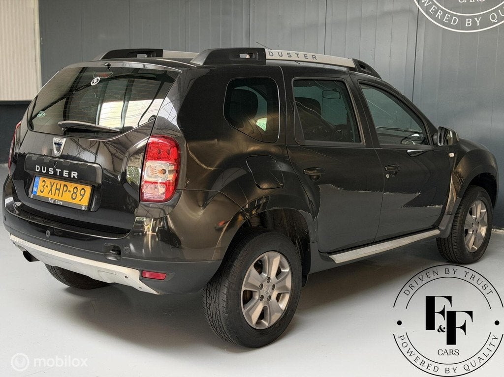 Dacia Duster 1.2 TCe Lauréate|NAP|CarPlay|Cruise|Leder, Auto's, Dacia, Voorwielaandrijving, Euro 5, 125 pk, Gebruikt