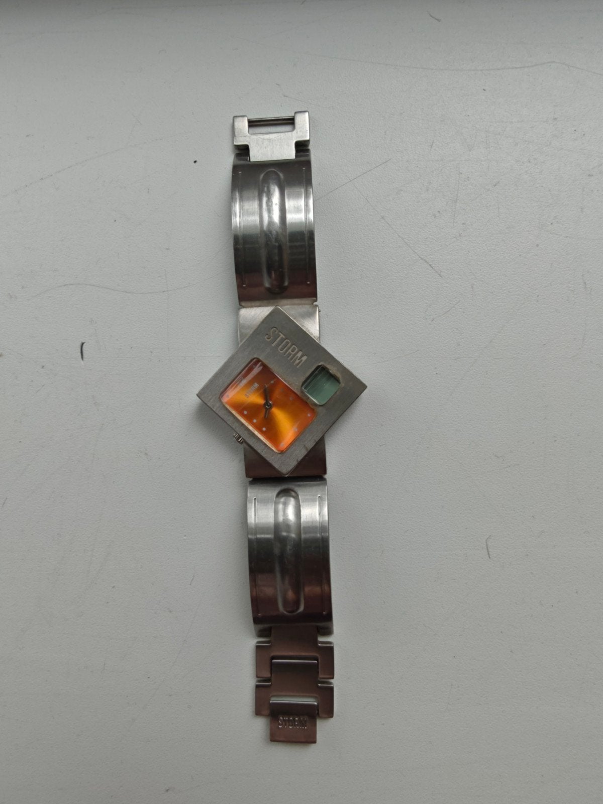Storm horloge met uniek oranje wijzerplaat, Overige merken, Staal, Gebruikt, Staal