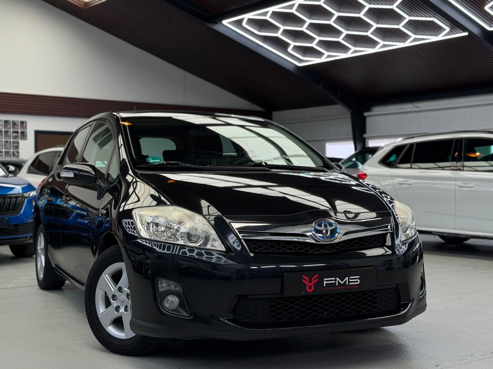 Toyota Auris 1.8 Full Hybrid Aspiration Navigatie, Euro 5, Stof, Gebruikt, Zwart
