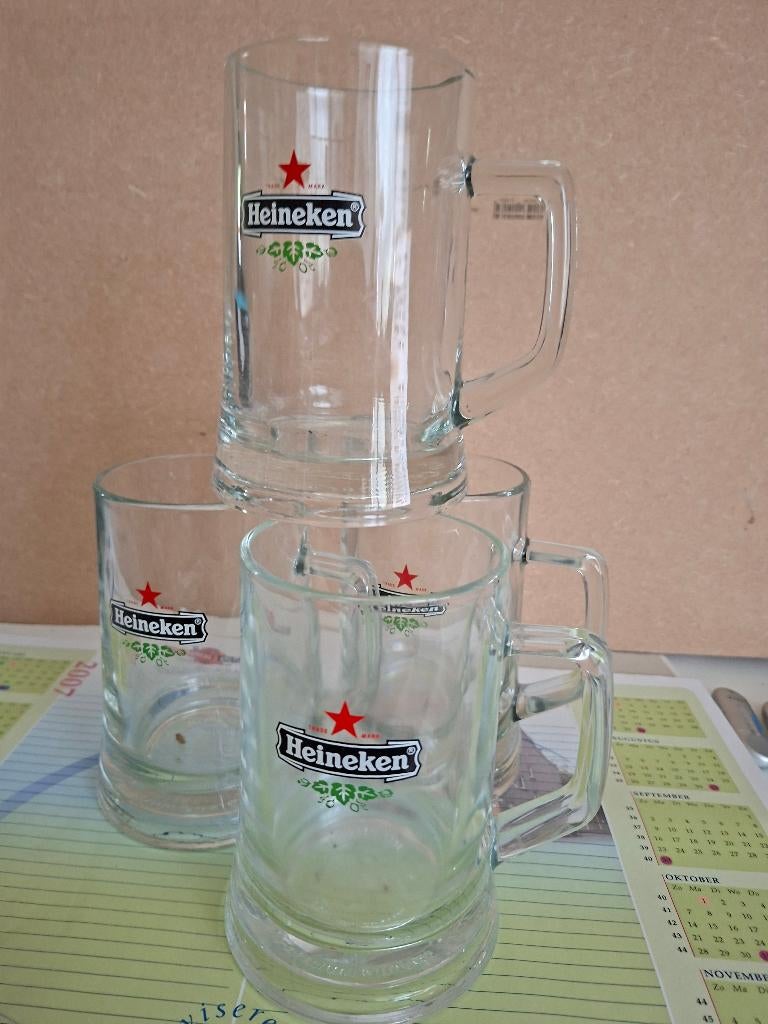 4 bierglazen Heineken, Ophalen of Verzenden, Zo goed als nieuw, Bierglas