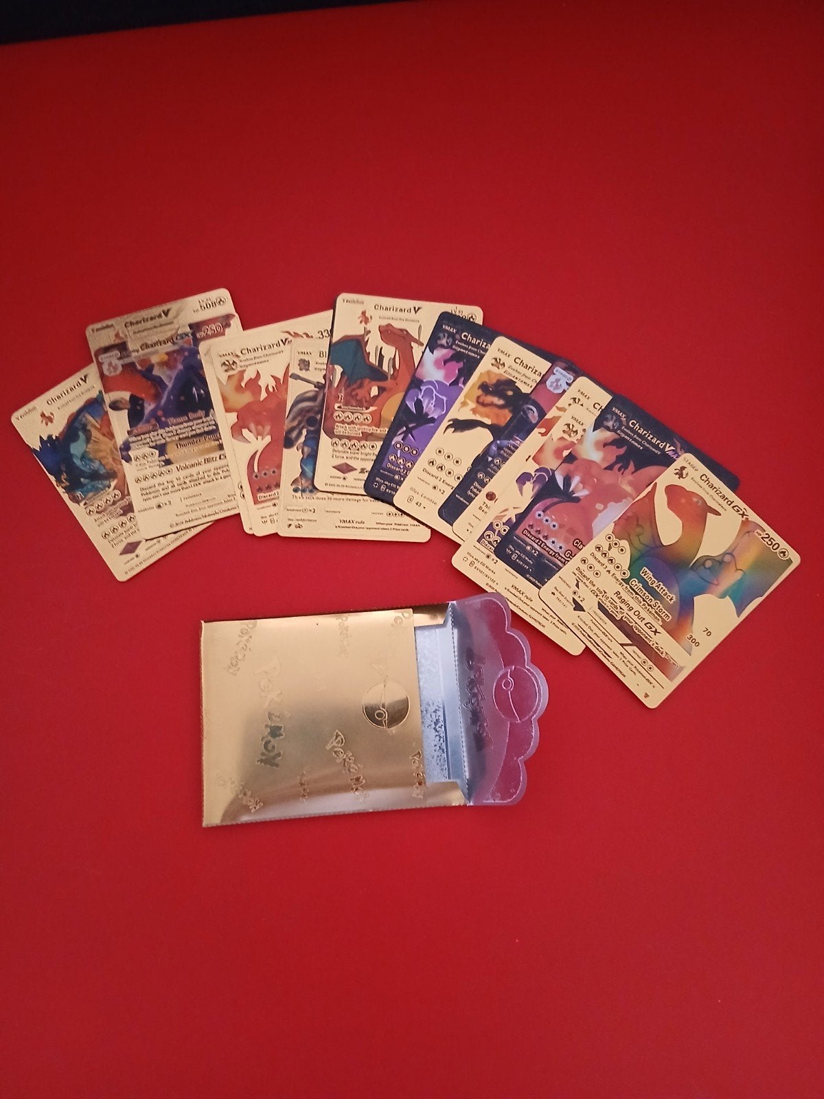 Gouden en Zwarte Charizard Pokémonkaarten (Niet Origineel), Ophalen of Verzenden, Zo goed als nieuw, Meerdere kaarten, Foil