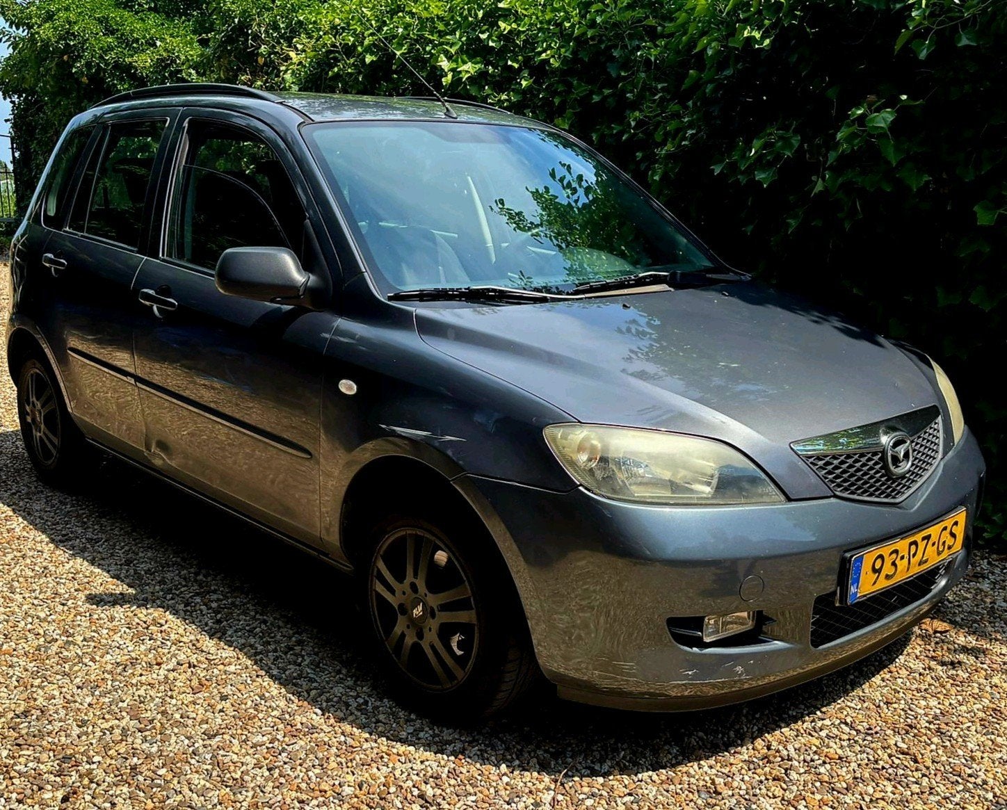 Mazda 2 1.4 16V 2005 Grijs, Auto's, Mazda, Voorwielaandrijving, 1025 kg, 15 km/l, 40 €/maand