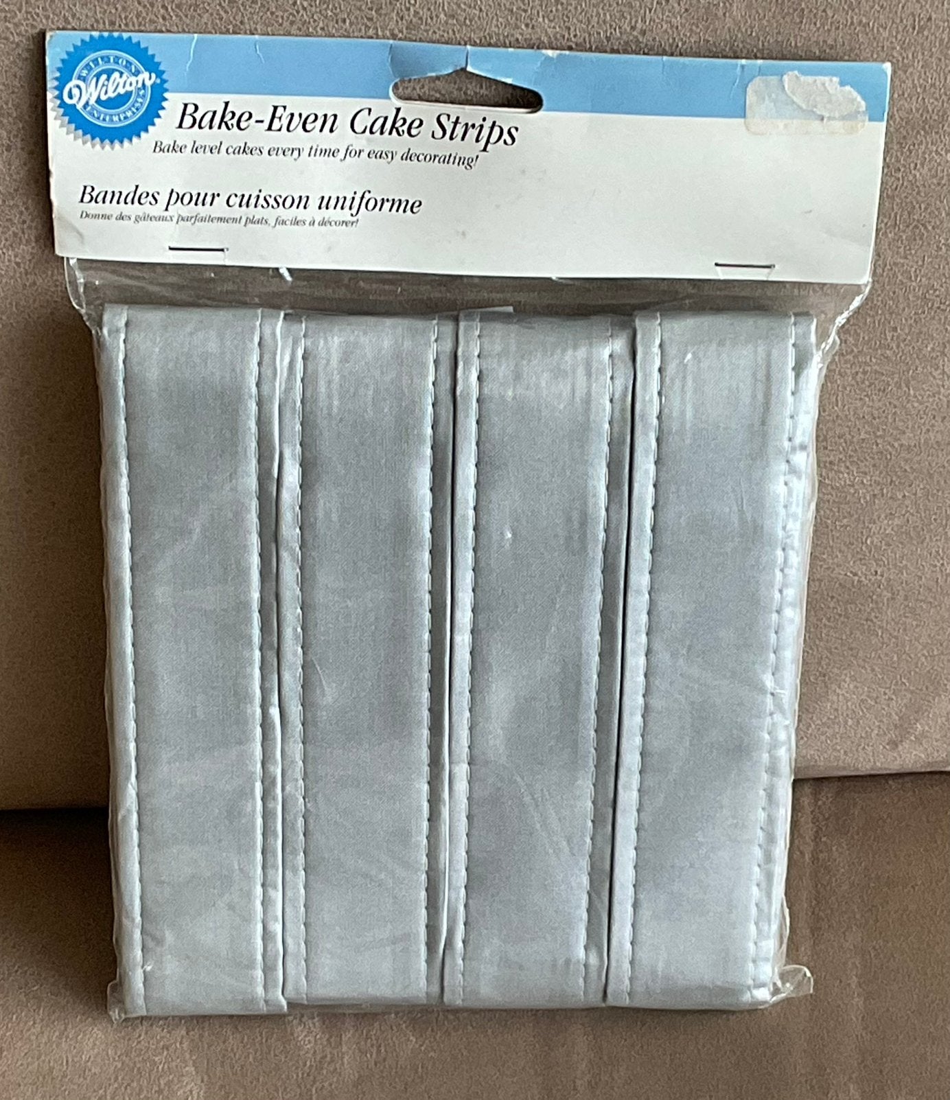 Wilton bake-even/bakriem taart-cake strips (nieuw), Ophalen of Verzenden, Nieuw, Taarten