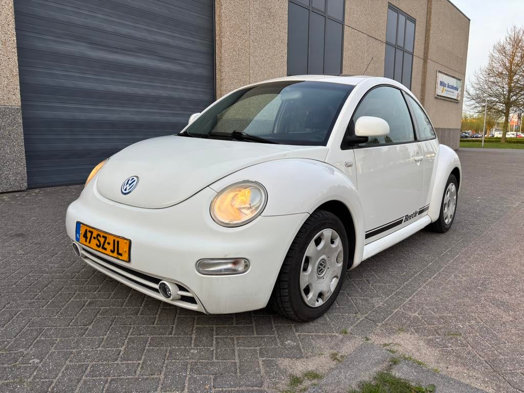 Volkswagen new beetle 2.0 automaat, Auto's, Stof, 1280 kg, 4 cilinders, 1984 cc