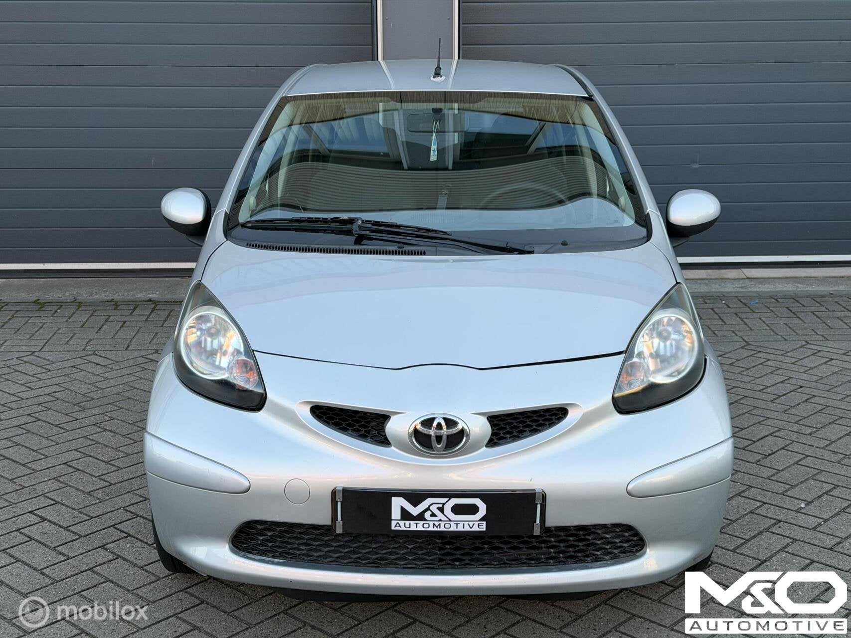Toyota Aygo 1.0-12V + | AIRCO | E-RAMEN | APK, Auto's, Voorwielaandrijving, Stof, Gebruikt, Zwart