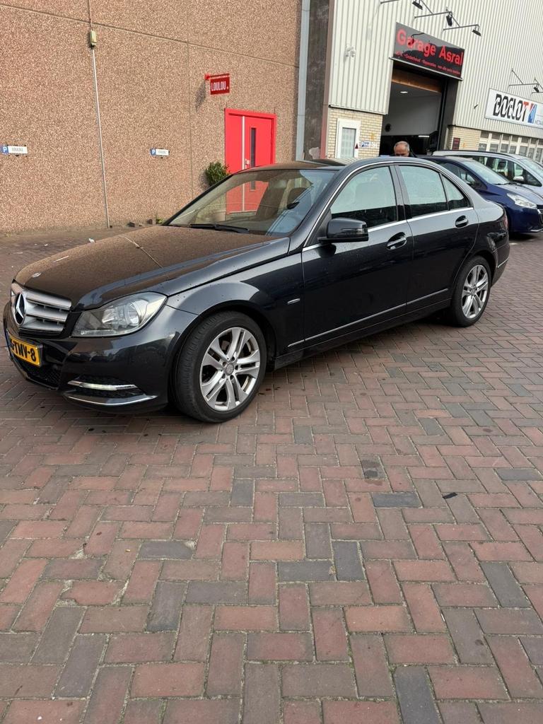 Mercedes-Benz C-Klasse 1.8 C200 Kompressor Sedan AUT 2012, Auto's, 1800 kg, Zwart, 4 cilinders, 1796 cc