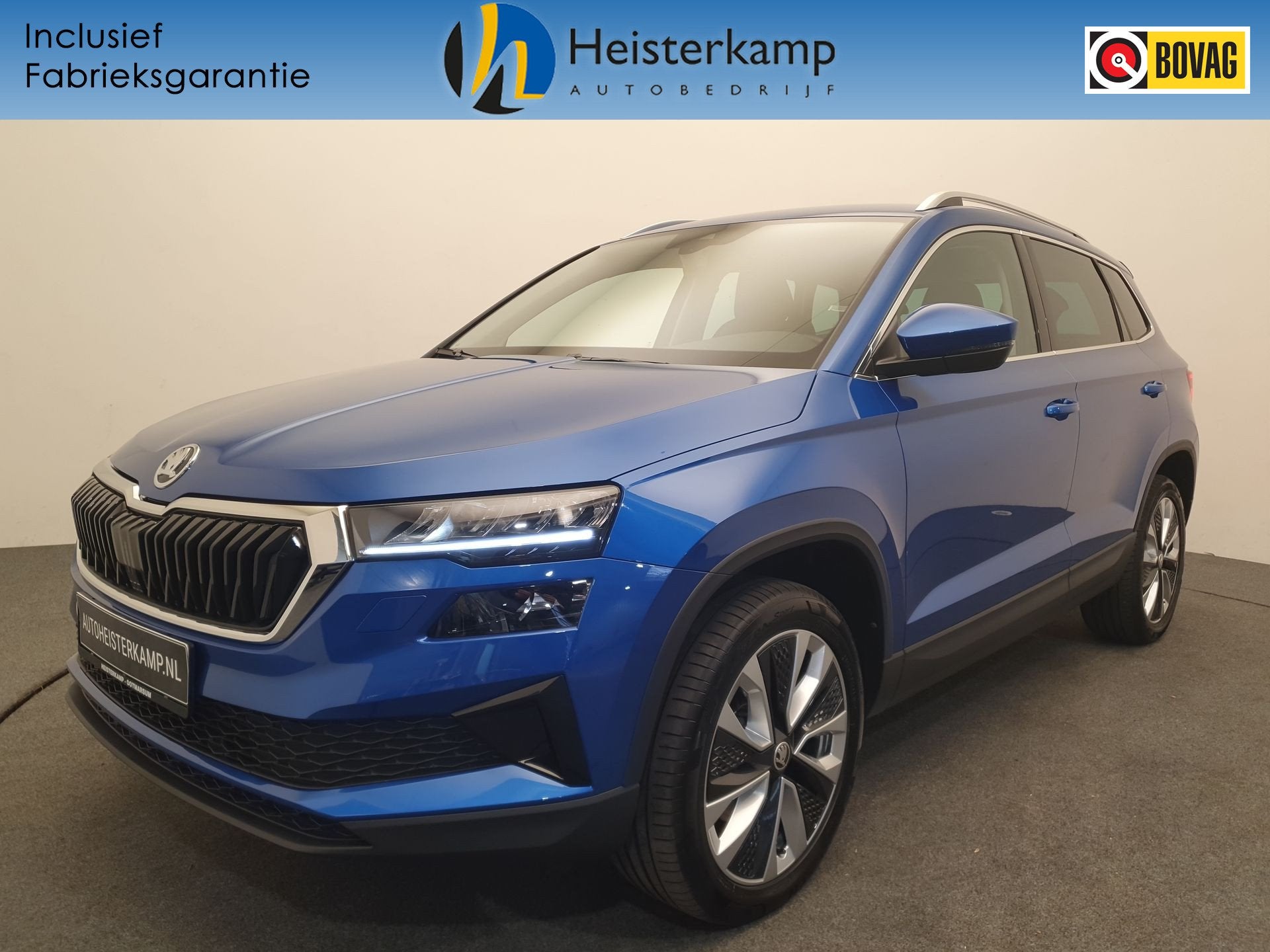 Skoda Karoq 1.5 TSI 150pk DSG/AUT Business Edition Winterpak, Auto's, Stof, Zwart, 4 cilinders, Blauw