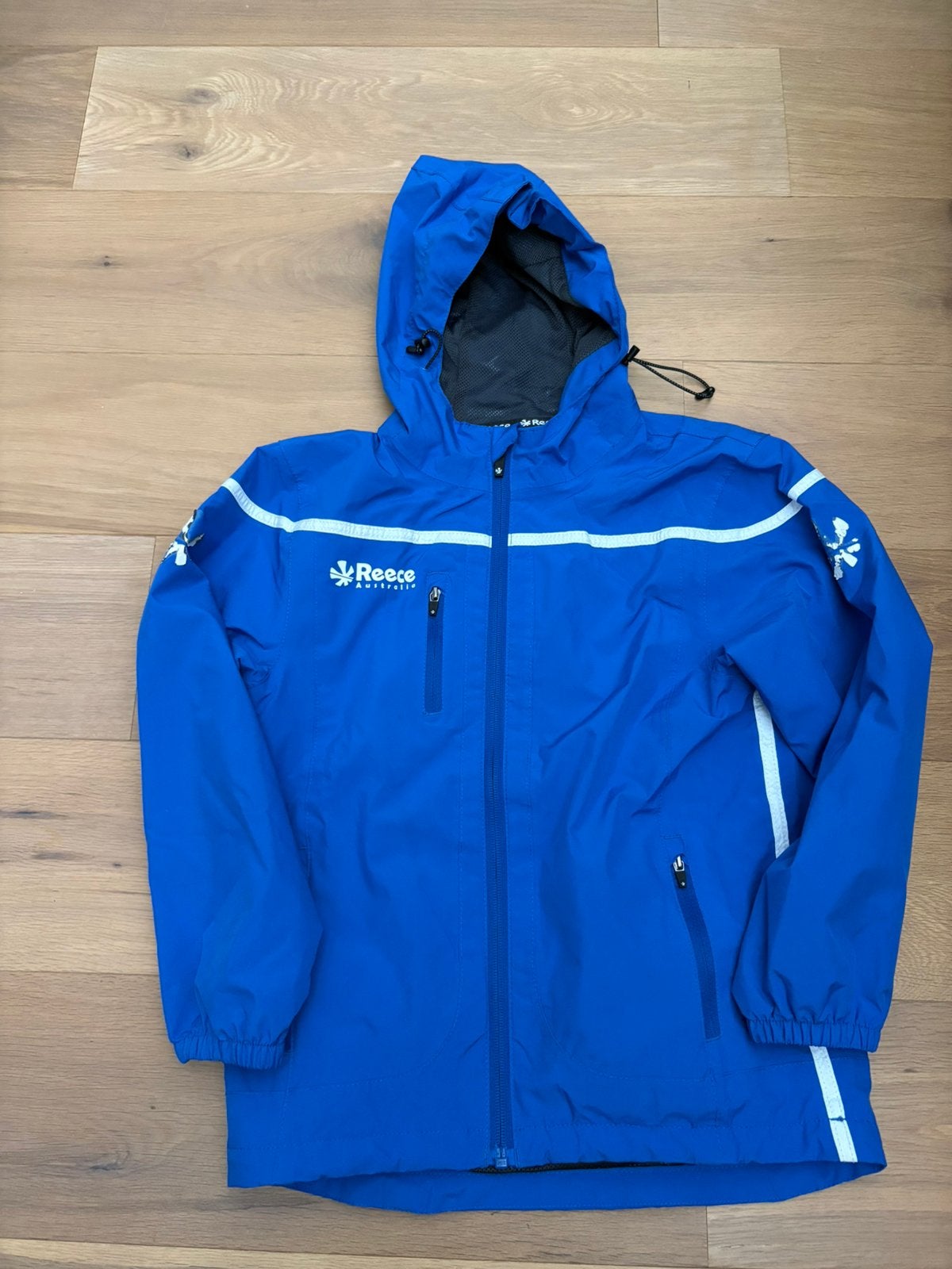 Reece hockey (regen) jasje maat 128, Ophalen, Gebruikt, Kleding