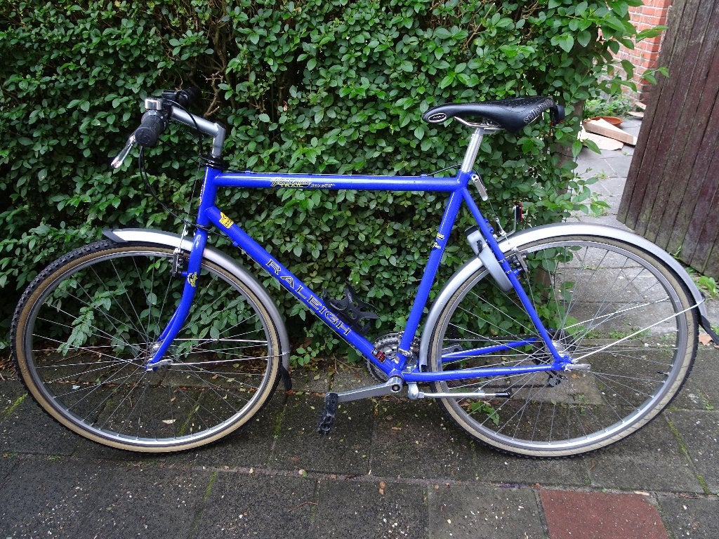Raleigh Pioneer Trail stadsfiets, 28 inch, Gebruikt, Velgrem, 57 tot 61 cm
