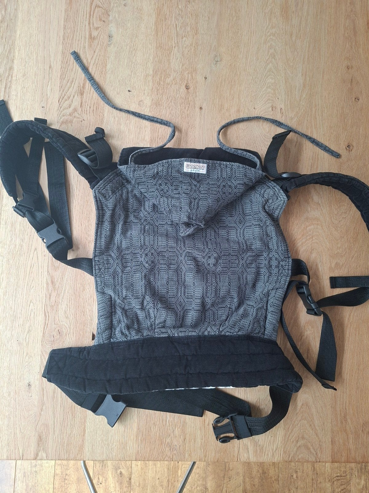 Wompat Peuterdraagzak met zonnekap, Ophalen