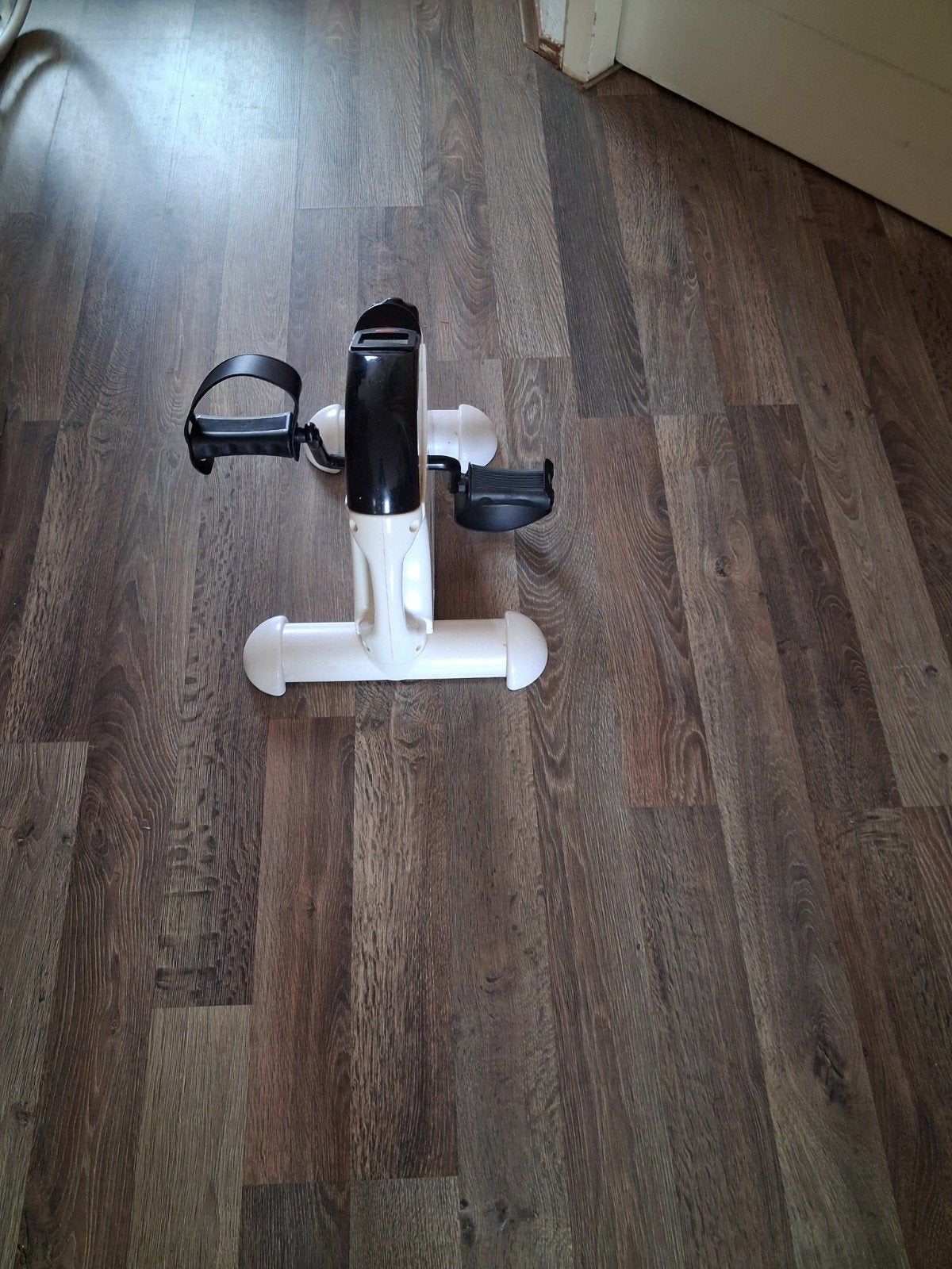 Compacte fietstrainer voor thuisgebruik, Ophalen