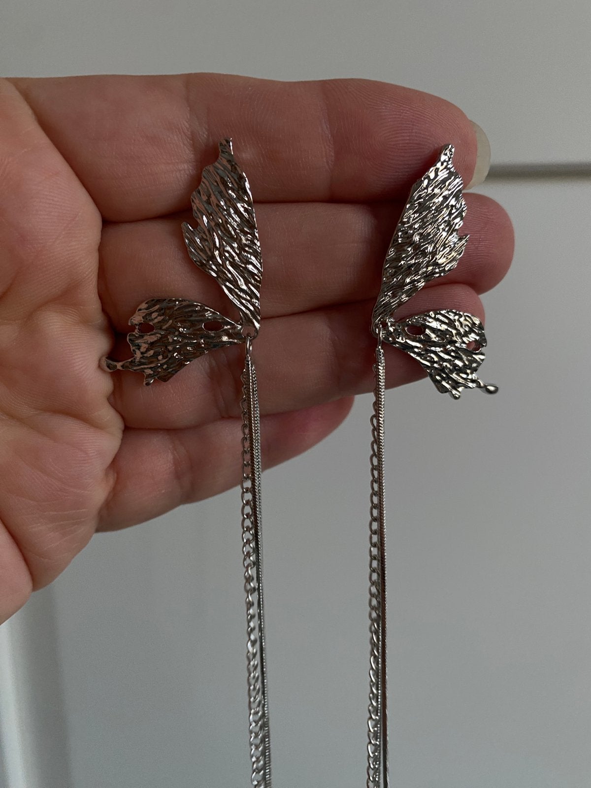 Hang vlinder vleugels oorbellen met slierten, Ophalen of Verzenden, Zo goed als nieuw, Zilver, Overige materialen