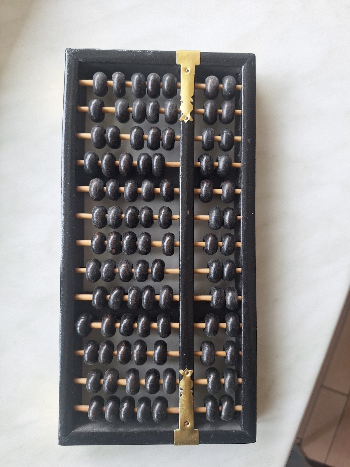 Chinese Suanpan/houten telraam, Ophalen