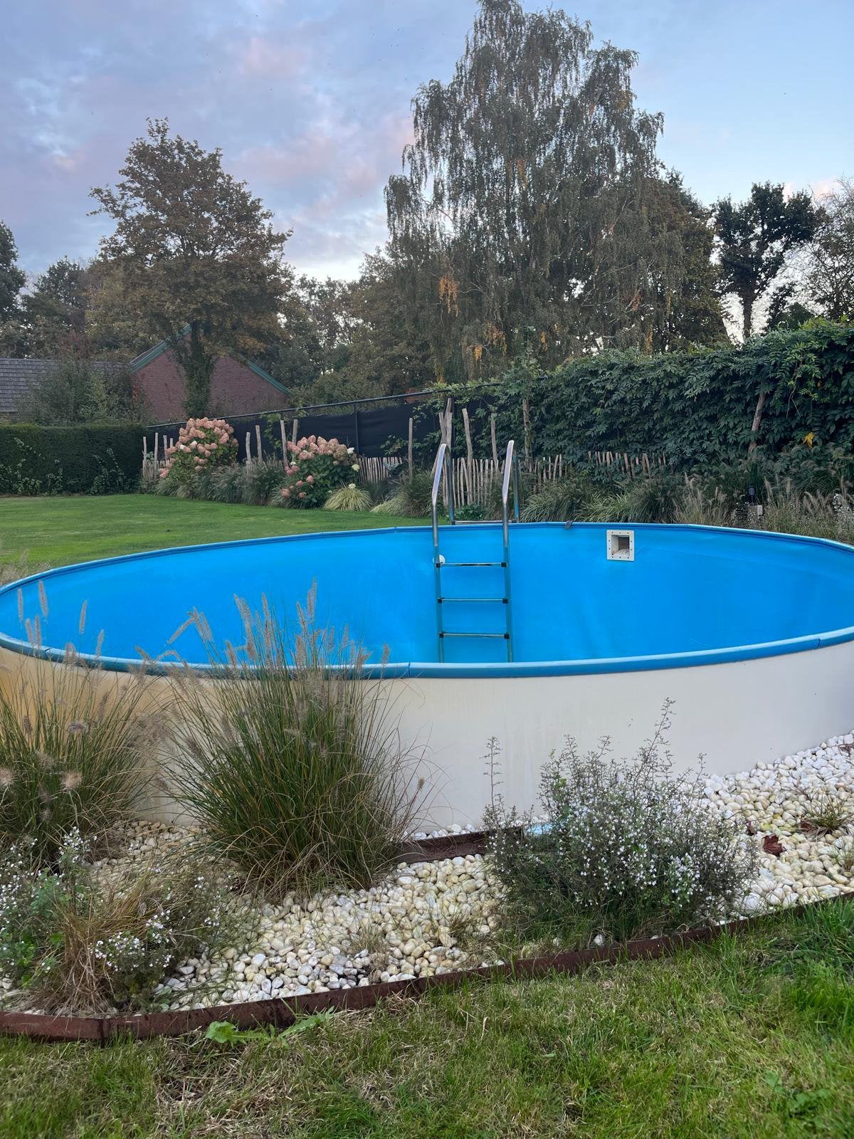 Foto 3 van Zwembad met stalen rand/warmtepomp en zandfilterpomp