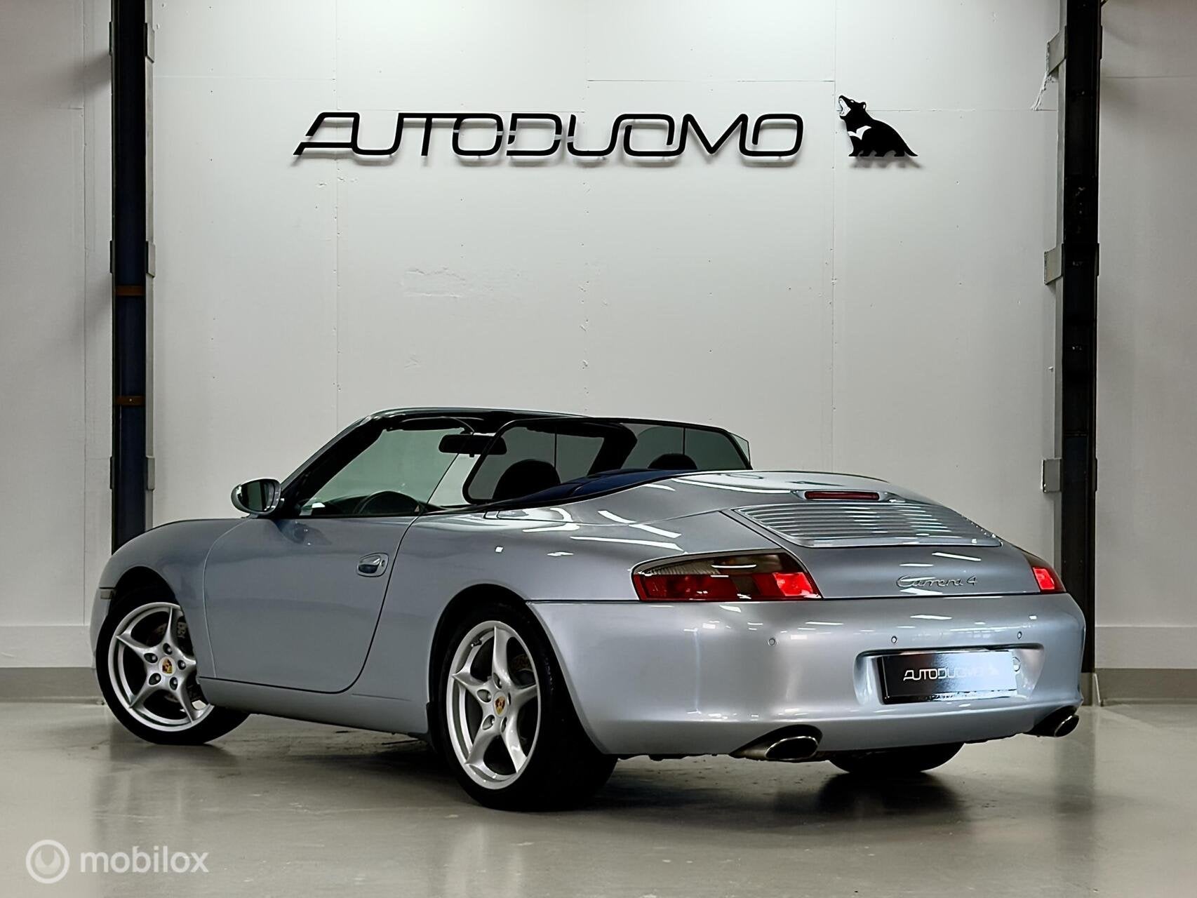 Porsche 911 Cabrio 3.6 Carrera 4 Hardtop | NAP | Leer | BOSE, Auto's, Dealer onderhouden, Gebruikt, Cabriolet, Vierwielaandrijving