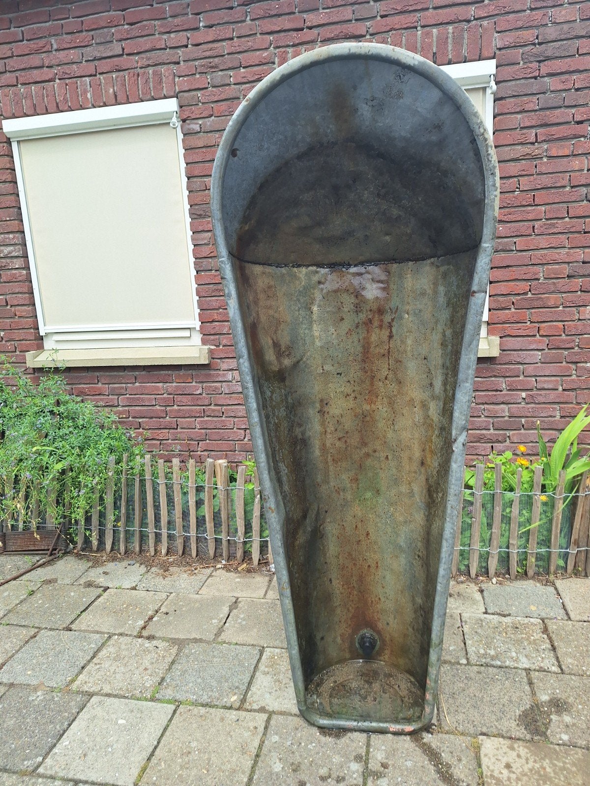 Zinken badkuip, Ophalen