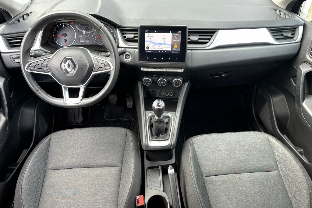 Renault Captur 90pk TCe Intense (bj 2022), Auto's, Stof, Gebruikt, Zwart, Origineel Nederlands