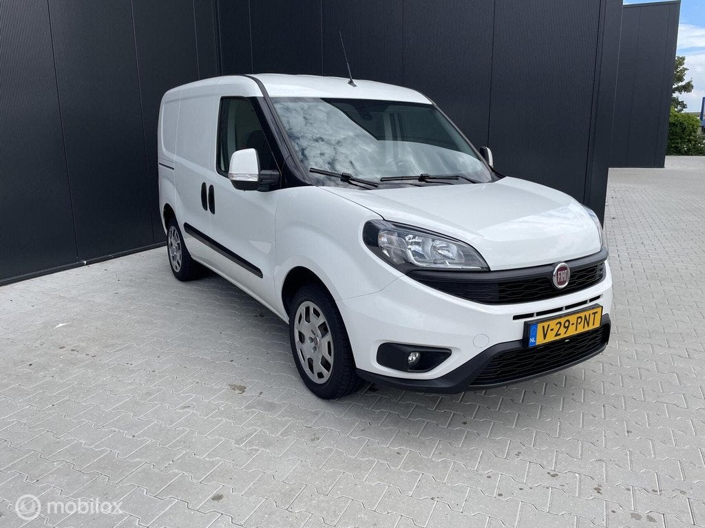 Fiat Doblò Cargo 1.4 Fire /MARGE/3Zits/CRUISE/NAVI, Auto's, Bestelauto's, Gebruikt, Euro 6, Wit, Bedrijf