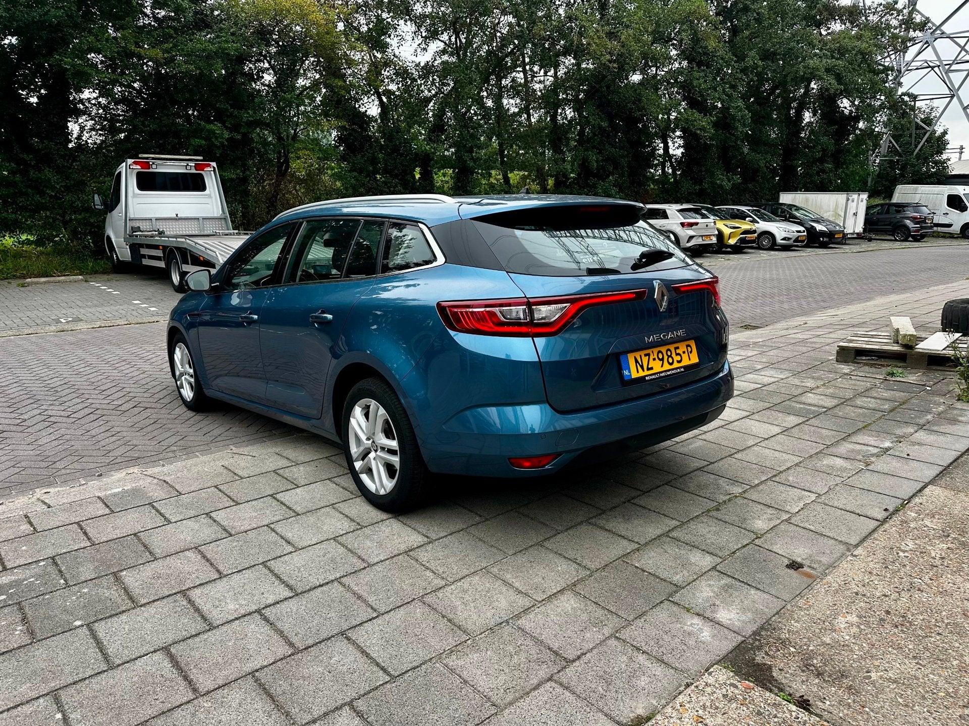 Renault Mégane Estate 1.5 dCi Zen Automaat, Auto's, Gebruikt, 4 cilinders, Blauw, Origineel Nederlands
