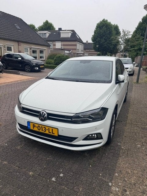 Volkswagen Polo 1.0 TSI 110pk 2021 Wit WEINIG KM, Auto's, Voorwielaandrijving, Dealer onderhouden, Stof, Zwart