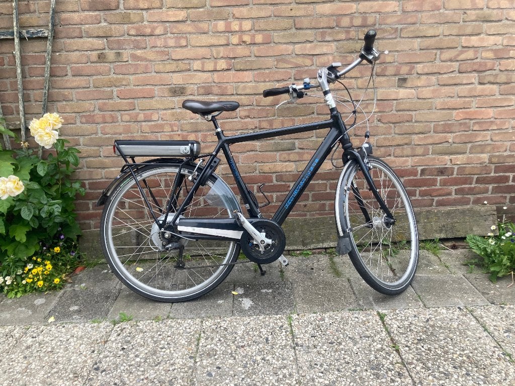 Koga Tesla E-bike herenfiets   mooie comfortabele fiets, Fietsen en Brommers, Elektrische fietsen, Minder dan 30 km per accu, Gebruikt