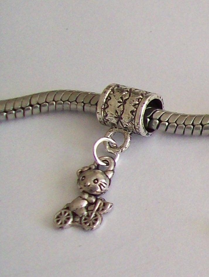 nieuwe zilver bedel/kettinghanger *HELLO KITTY OP FIETS*, Ophalen of Verzenden, Nieuw, Zilver, Overige merken