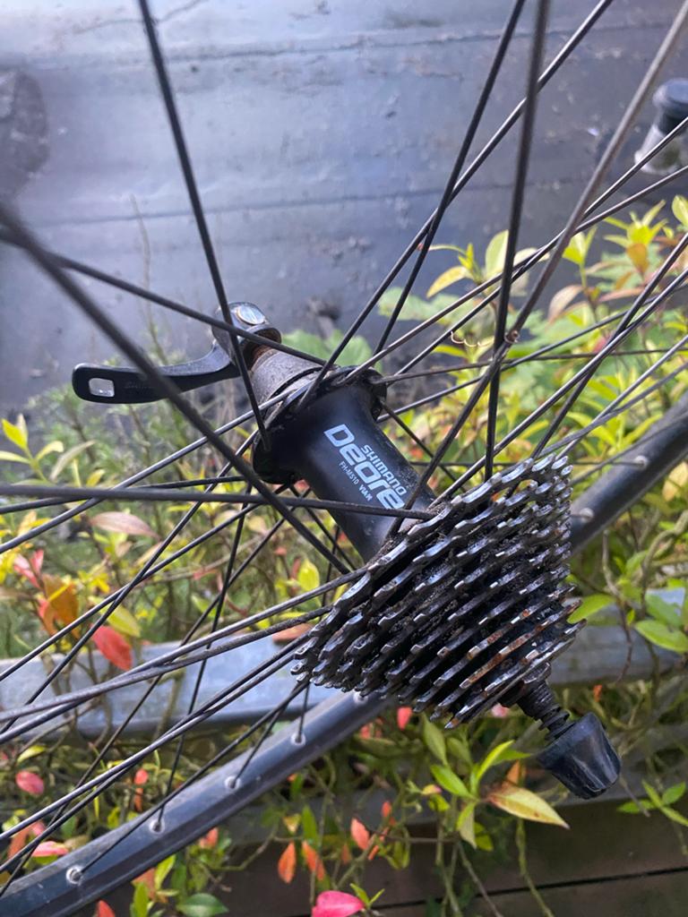 Achterwiel met Shimano Deore naaf en Continental band, Fietsen en Brommers, Fietsonderdelen, Zo goed als nieuw, Aluminium, Stadsfiets