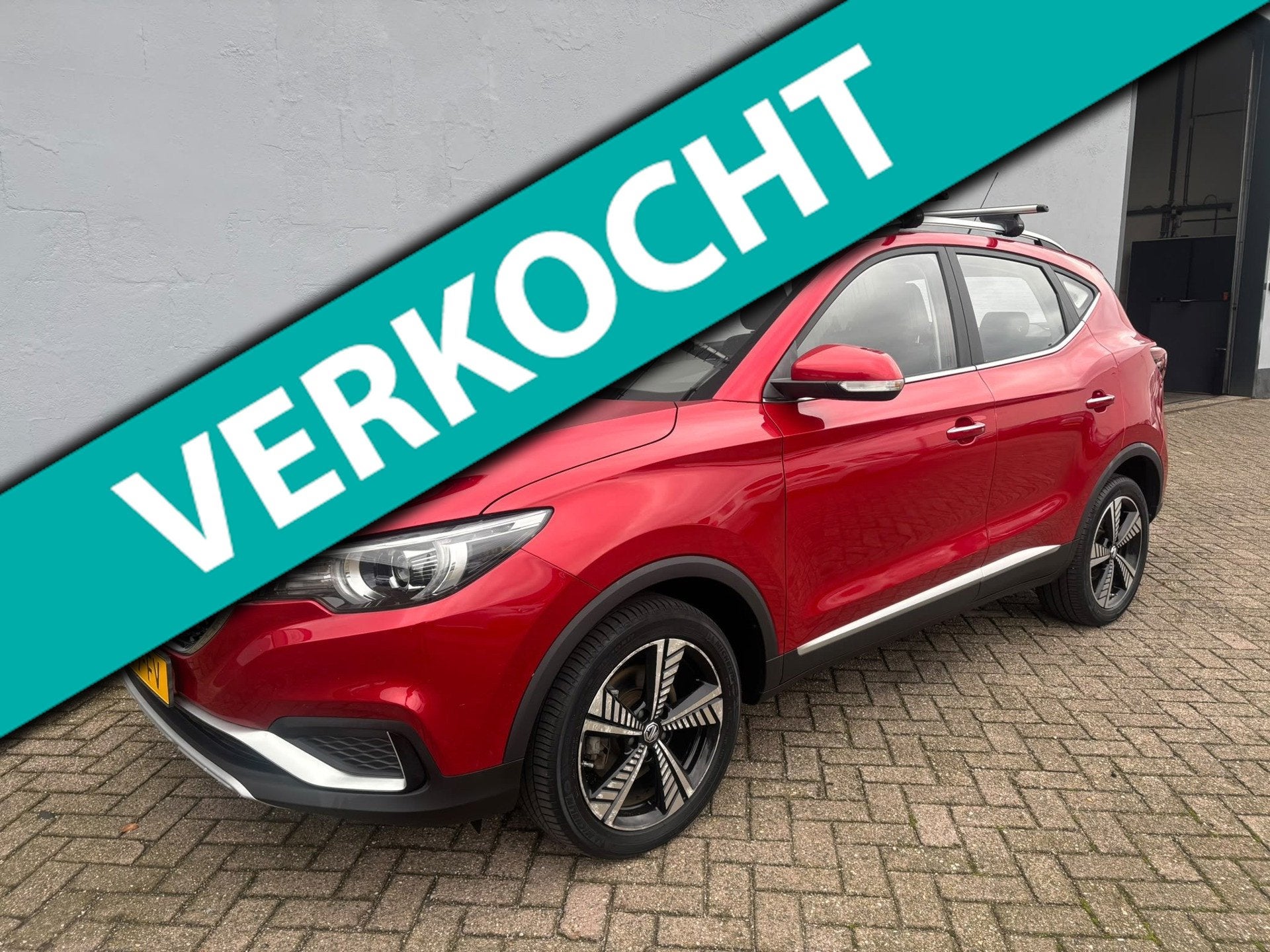 MG MG ZS EV Luxury 45 kWh - Panorama - Leder - Dak Dragers, Auto's, Gebruikt, Huisgarantie, Met garantie (alle), ZS