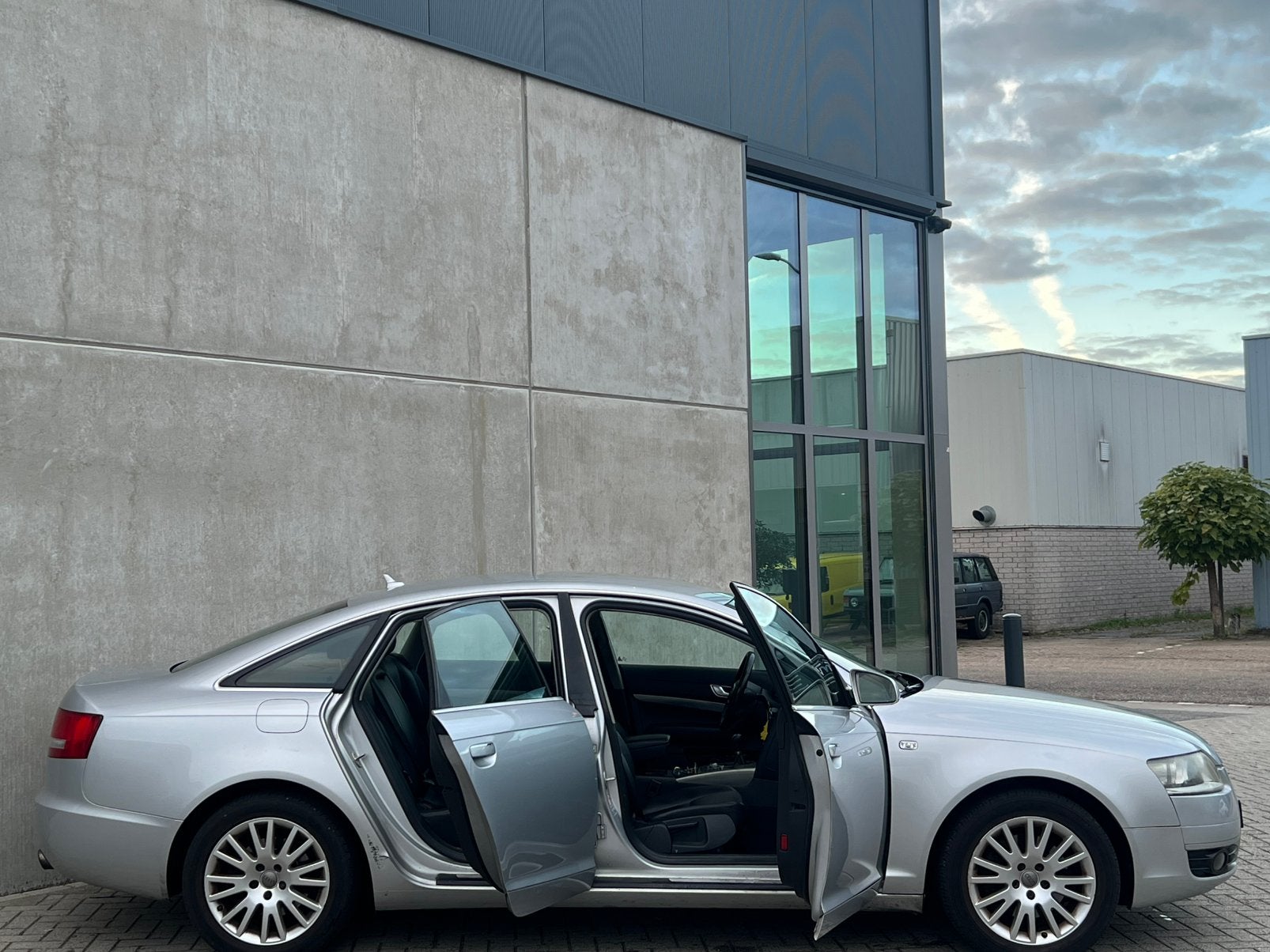 Grijze Audi A6 2.0 TFSI Sedan 170PK Benzine/APK/Airco/Navi!, Auto's, Dealer onderhouden, Zwart, 4 cilinders, 1984 cc