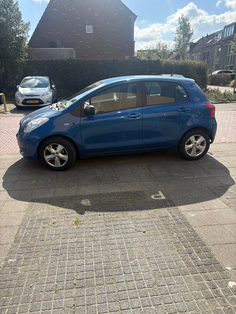 Toyota Yaris 1.3 16V Vvt-i 5DR 2006 Blauw, Voorwielaandrijving, 40 €/maand, 4 cilinders, 547 kg