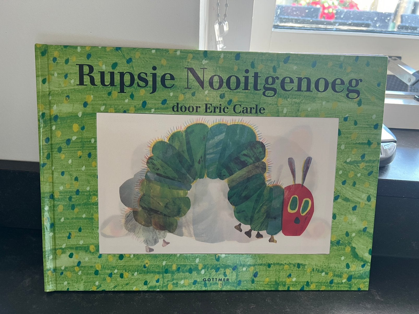 Speciale editie van rupsje Nooitgenoeg door Eric Carle, Ophalen of Verzenden, Zo goed als nieuw, Prentenboek