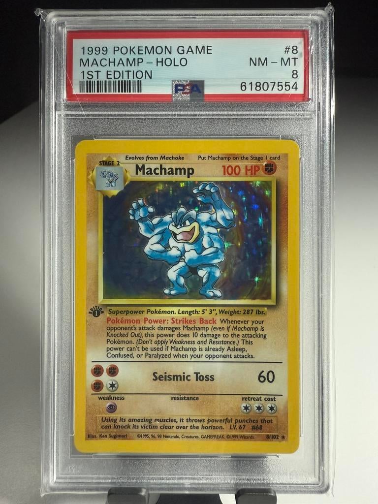 Machamp 8/102 1st edition - Base set (PSA 8), Ophalen of Verzenden, Zo goed als nieuw, Losse kaart, Foil