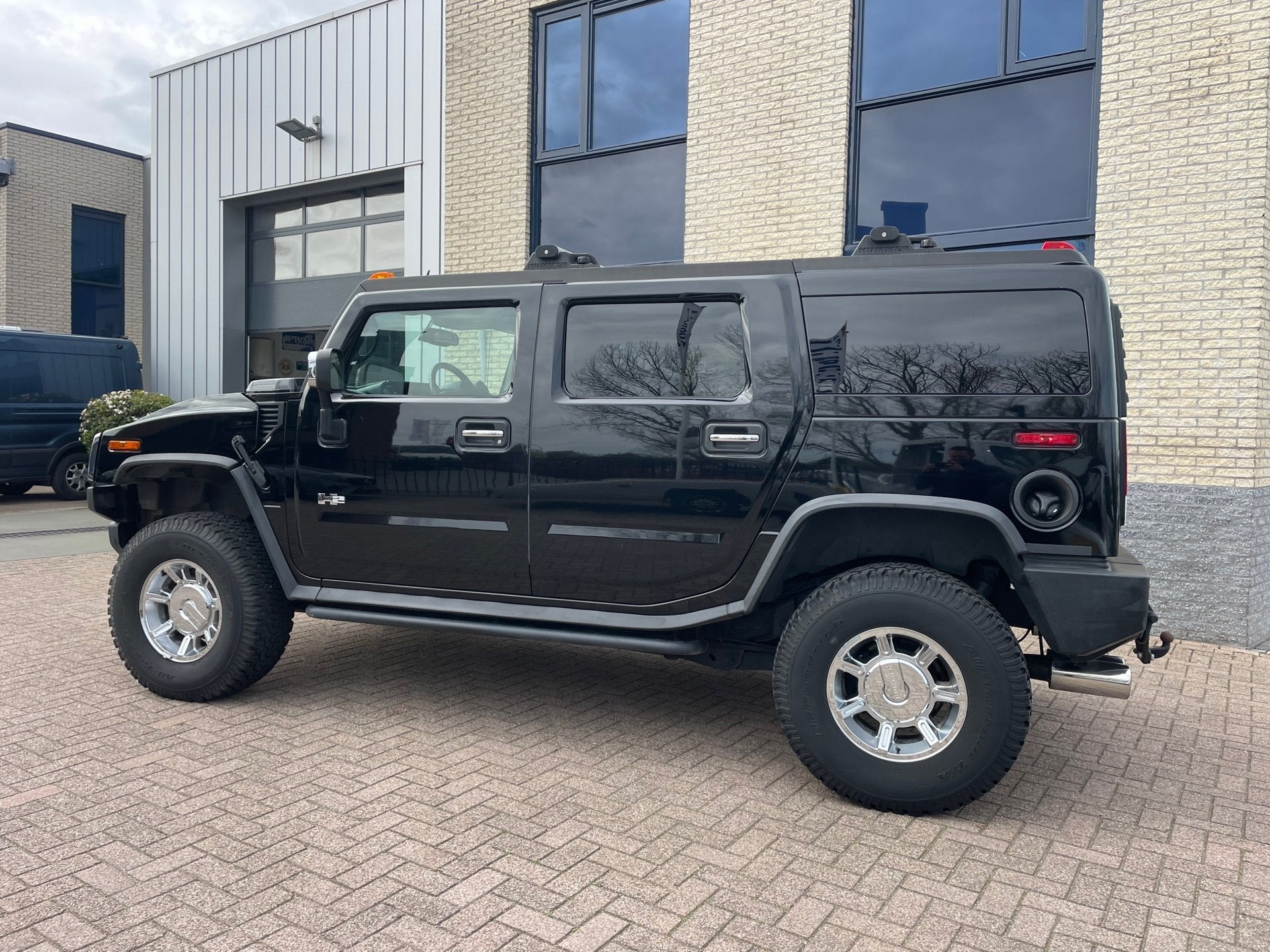 Hummer H2 6.0 V8- trekhaak- Bose-stoelverwarming, 318 pk, Gebruikt, 3000 kg, Zwart