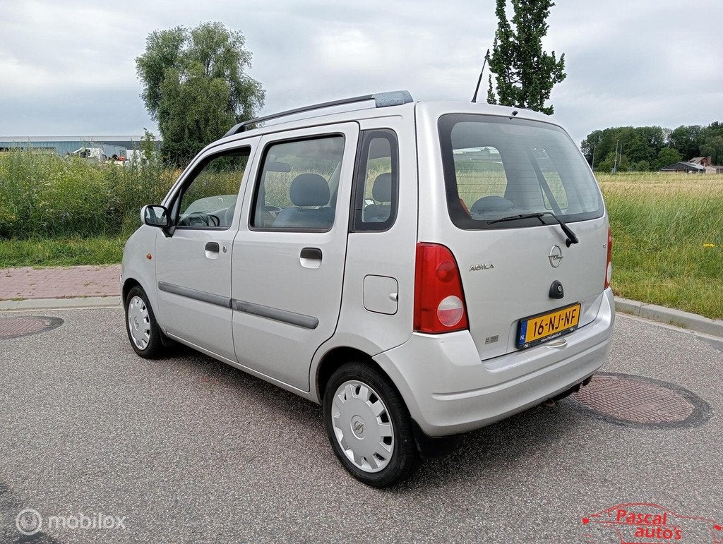 Opel Agila 1.2-16V Enjoy airco nw apk hoge instap, Auto's, Voorwielaandrijving, Elektrische ramen, Stof, Origineel Nederlands